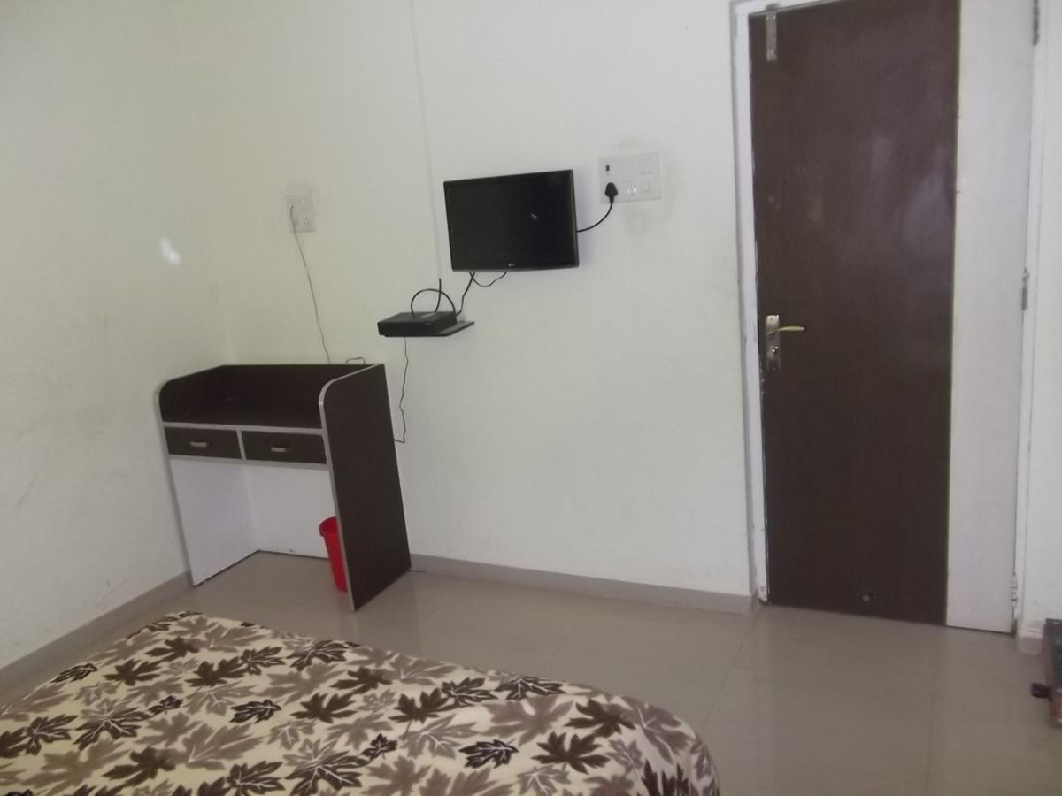 Hotel Rajyog Ranjangaon Ganpati Стая снимка